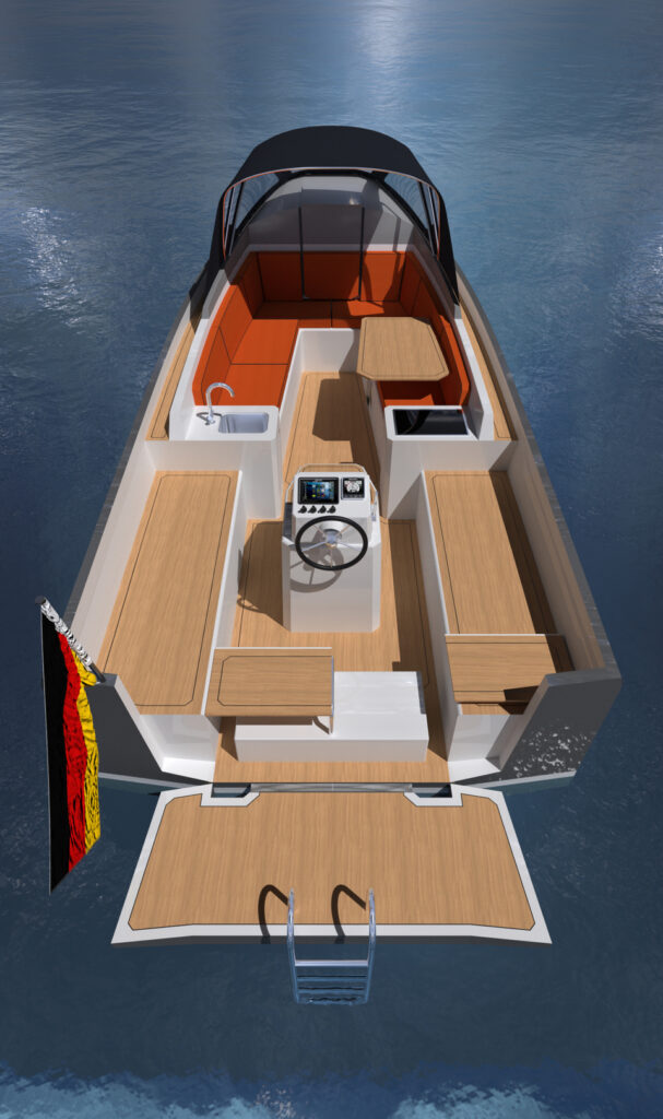 Tide24M-Sloep, Blick in das Fahr- und Gäste-Cockpit. Steuerstand, Kühlschrank und Spüle sind im Zugriff.